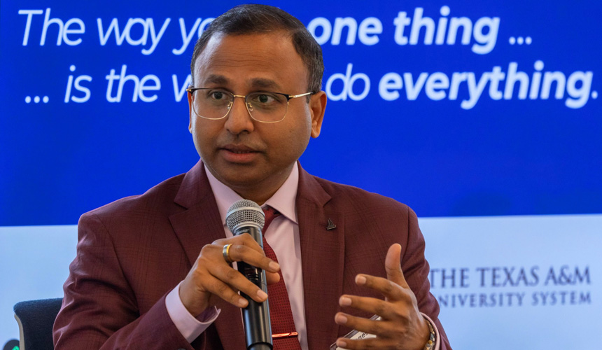 Magesh Rajan speaking at a seminar