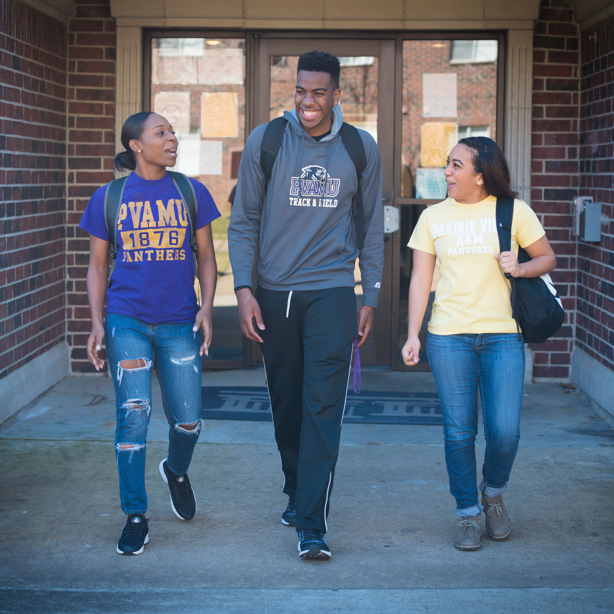 Group of students walking on campus