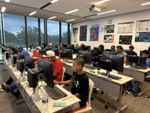 ACEC student participants exploring the agricultural metaverse in the computer lab.