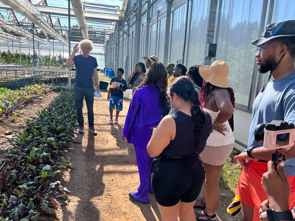 Tim Hauber explaining operations at the Oasis Grow House, One Eleuthera Foundation and Center for Training and Innovation, Rock Sound, Eleuthera.