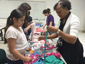 Demonstration on making a T-shirt necklace