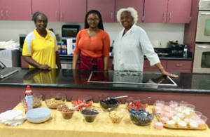 Dr. McWhinney And Assistants Atthe Demonstration Kitchen