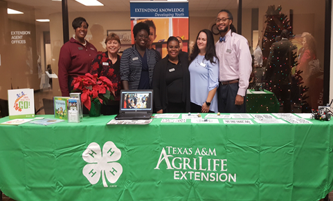 Marcus Glenn, extension agent for 4-H Youth Development, is photographed with other 4-H staff in Harris County