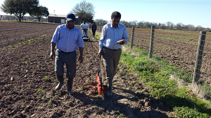Post-doctoral scholars, Almoutaz ElHassen and Haimanote Bayabil, and their students are scanning the field using EM38 and ground penetrating radar