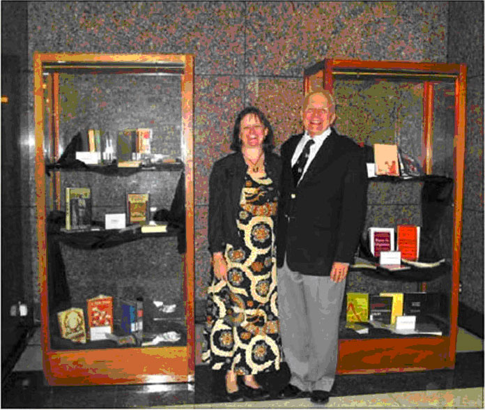 picture of DR. AND MRS. ROBERT D. KING WITH SELECTED VOLUMES OF HIS DONATED COLLECTION TO THE JOHN B. COLEMAN LIBRARY, FEBRUARY 2007