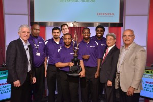 quiz bowl team holding trophy