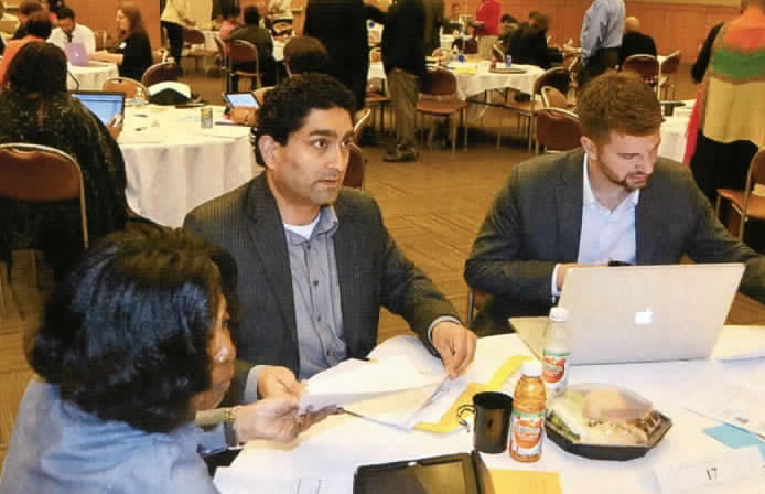 Pictured (L-R): Focus Group 17 members Cheryl Moore, Arsenio Rodrigues, and Ross Wienert. Other members at the table included Lenice Brown, Lawrence McNeil, Yvette Barker, Betty Ricks, and Kenyatta Simmons.