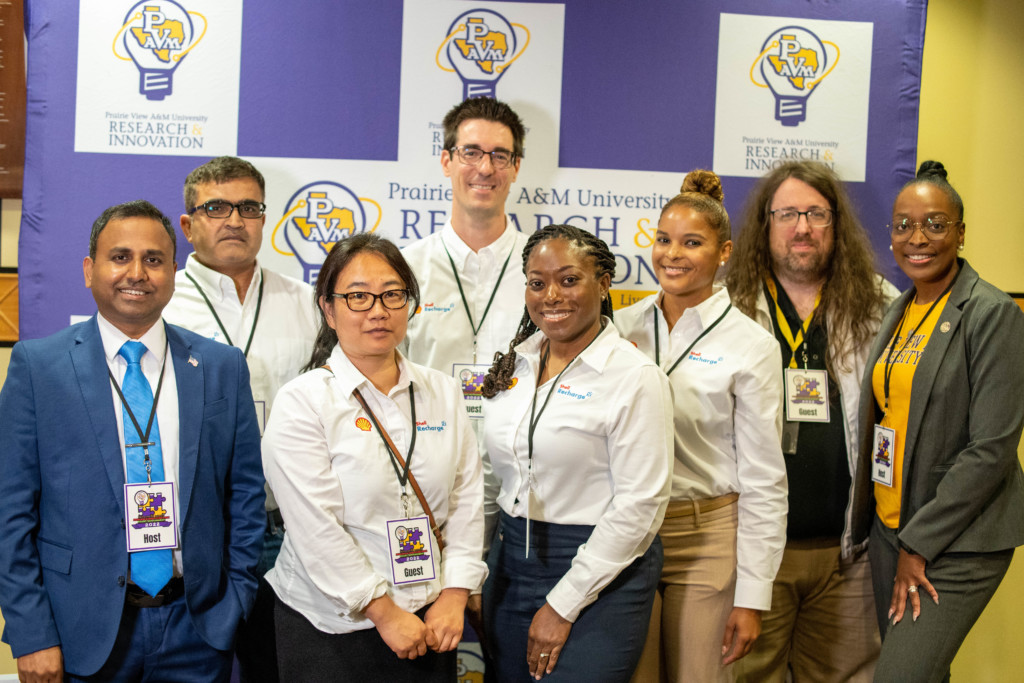 VP Magesh Rajan (left) and Business Development Specialist Najla Streety (right) with members of the Shell team.