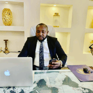 Emma Emmanuel sitting at a desk