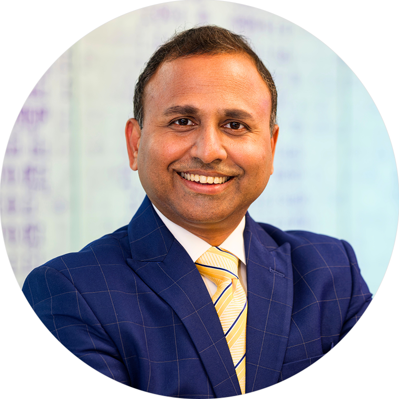 Professional headshot of Magesh Rajan