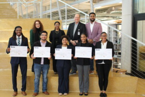 Picture of Dean, Assistant Dean, Turner Construction employees, and scholarship winners.