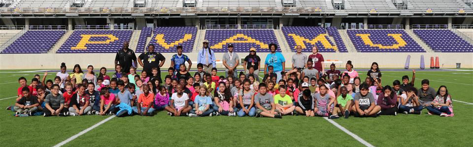 Students touring the PVAMU football field