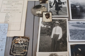 Mementos from the photo album of Annabelle Mammie Green, a granddaughter of Nearest Green. Credit Nathan Morgan for The New York Times