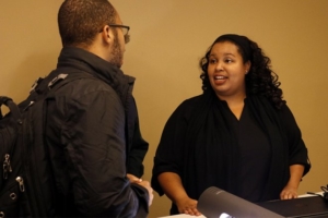 Accounting junior Alton Braxton, left, asks LaToya Devezin, African-American community archivist for the Austin History Center, a question after her talk on West Austin’s black history. (Credit: Hannah Simon, Daily Texan Staff)