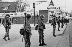 South Carolina National Guard line up near the segregated bowling alley in Orangeburg, S.C. on Feb. 8, 1968. (Associated Press)