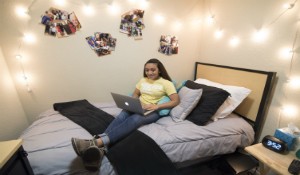 female student sitting in room