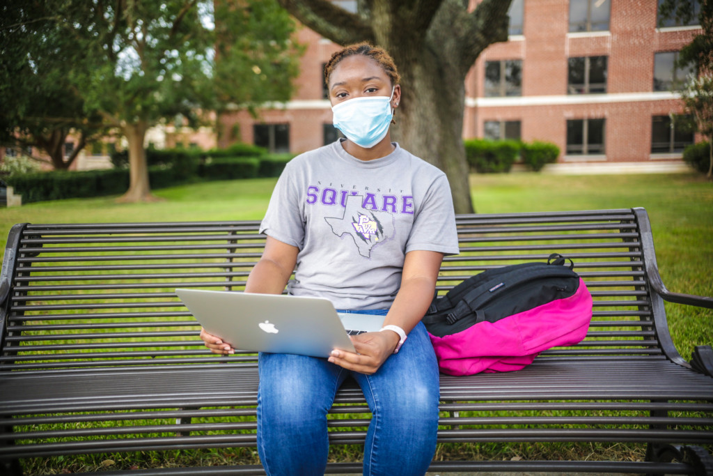 Greene works on her laptop in between classes. “Being on campus is different this semester, but I still like it,” she said. “I'm trying to stay on top of things. I'm looking on the Canvas site every day, putting things on my calendar to make sure that I'm doing everything right, and reaching out to my professors if I need help.”