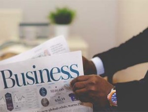 Man holding newspaper