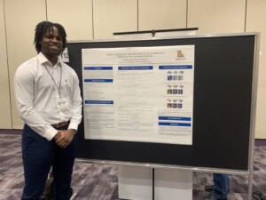 Ainomugisha at R&I Month 2025, Student Research Day