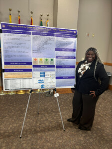 Youngblood presents her research at a conference.