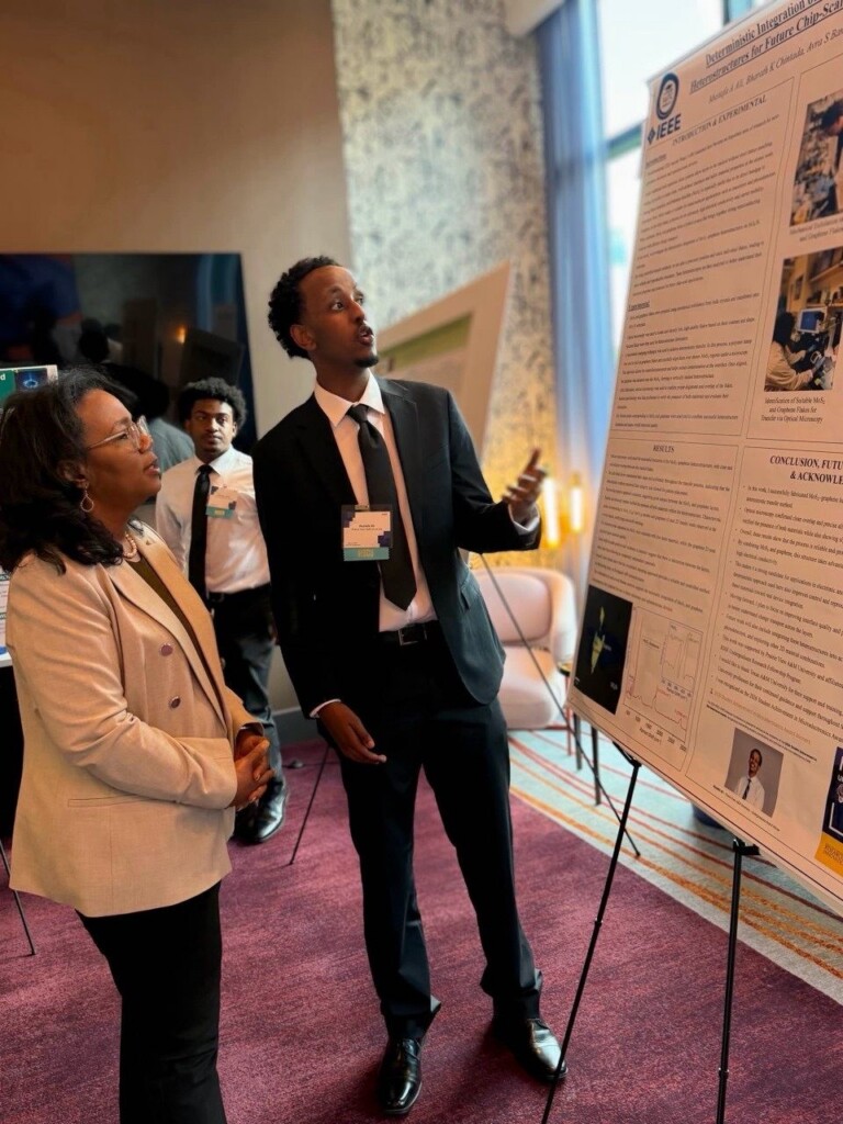 Mustafa A. Ali presents his research at a conference in Atlanta.